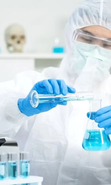 man with chemical resistant gloves