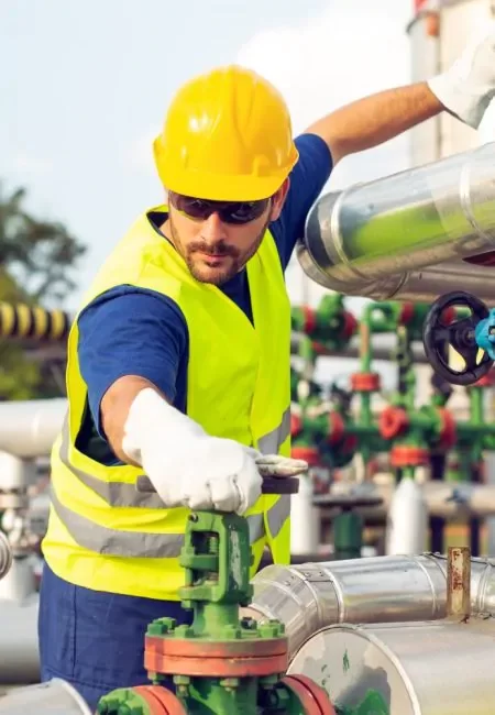 man with oil resistant gloves
