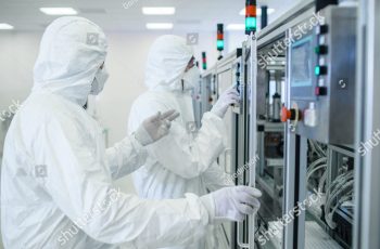 excia product stock photo team of scientists in sterile protective clothing work on a modern industrial d printing machinery 1268258770 1