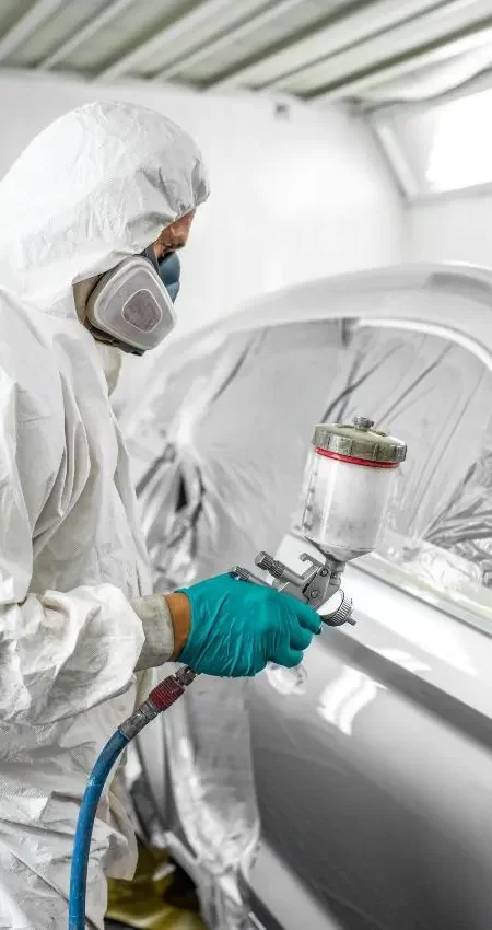 worker with automotive gloves